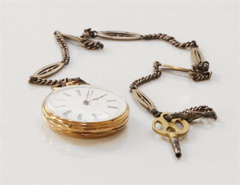 Taschenuhr mit Uhrenkette und Schlüssel.