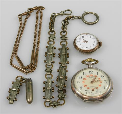 Konvolut: 2 silberne Taschenuhren, 2 Uhrketten, 1 Geschoß.