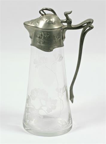 Deckelkanne, JUGENDSTIL, transparenter Glaskorpus mit Zinnmontur, deutsch um 1900.