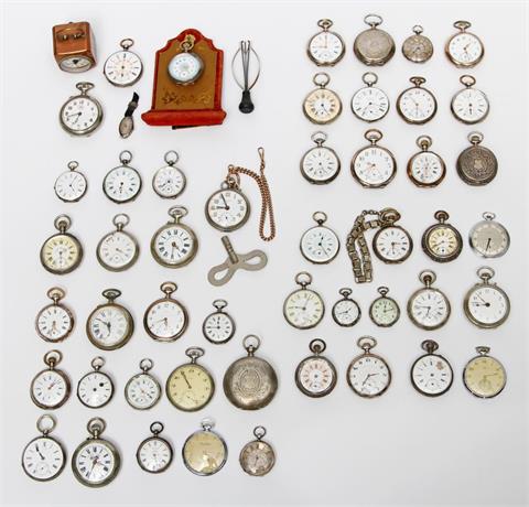 Konvolut: Div. Taschenuhren, eine Damenuhr, ein Wecker, tlw. Silber und Metall,