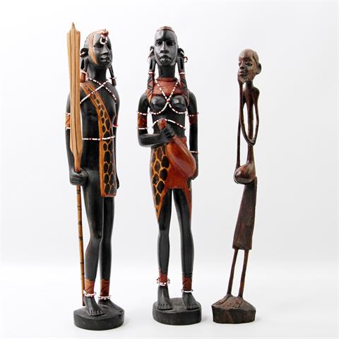 3 Skulpturen von Afrikanern aus Holz. AFRIKA, 20. Jh.