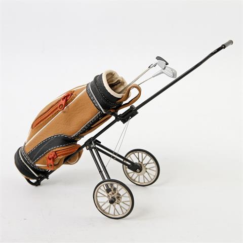 Dekoratives Golfbag auf Trolley,