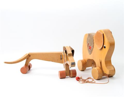 Zwei Holzspielzeuge Hund und Elefant, 20.Jh.,