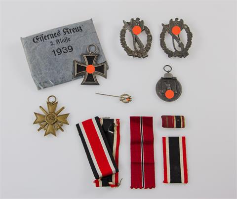 III. Reich - Kleiner Nachlass eines Frontsoldaten mit Eisernem Kreuz 2. Klasse 1939 und Band sowie Verleihungstüte (beschädigt),