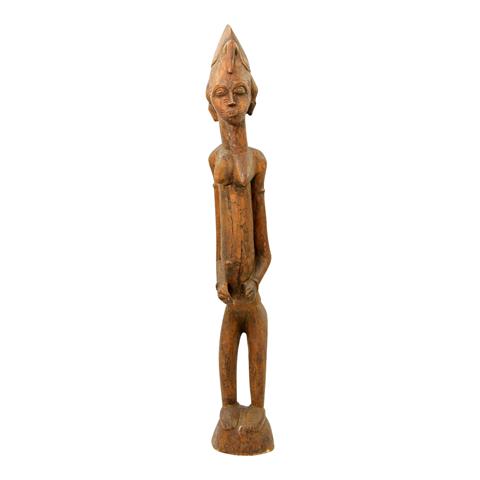 Stehende weibliche Figur aus Holz. BAULE/ELFENBEINKÜSTE