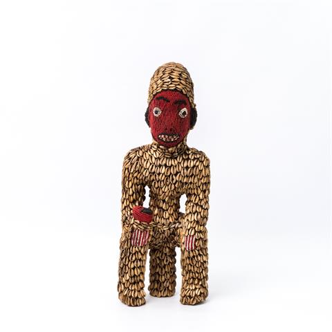 Skulptur einer sitzenden Figur.  AFRIKA, 20. Jh.