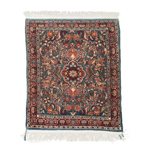 Orientteppich. IRAN, 20. Jh., ca. 90x75 cm.
