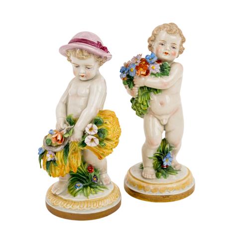 MÜLLER & CO., VOLKSTEDT (wohl), zwei Porzellanfiguren aus der Serie „Vier Jahreszeiten-Putti“