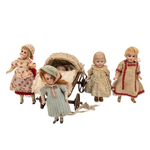 Konvolut aus 5 kleinen Puppen, 1. H. 20. Jh.,
