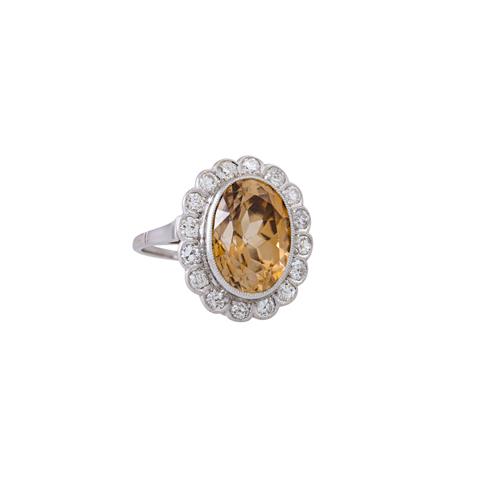 Ring mit braunem Zirkon umgeben von Diamanten, zus. ca. 1,2 ct,