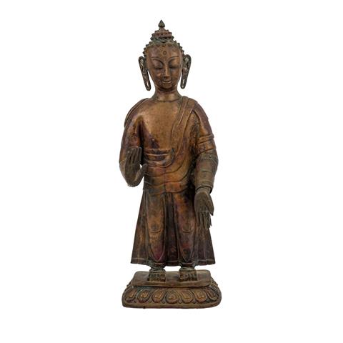 Stehende Buddha-Figur, um 1920.