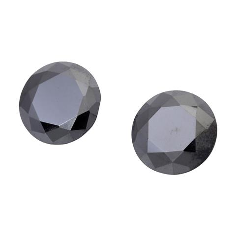 2 schwarze Diamanten zus. 7,38 ct,