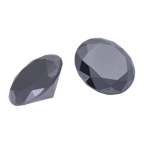 2 schwarze Diamanten von zus. ca. 8,5 ct,