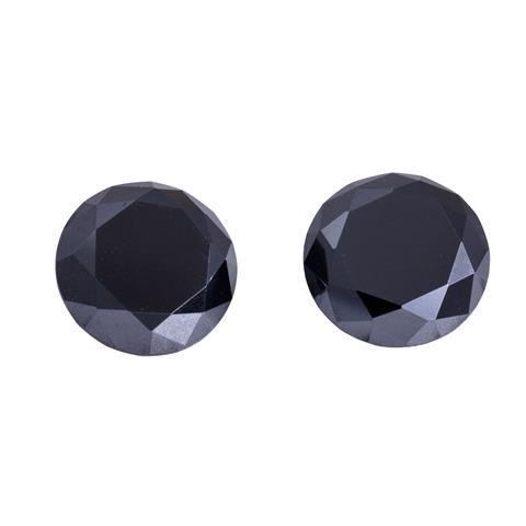 Paar schwarze Diamanten von zus. ca. 7,8 ct,